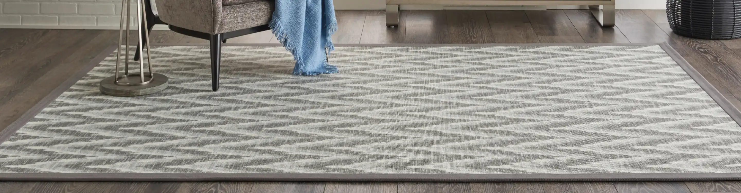 Beige and greige area rug in College Point, NY, home 